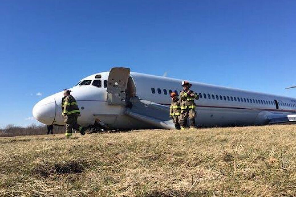 The airplane decelerated following the rejected takeoff but was traveling too fast to be stopped on the remaining runway.  It departed the end of the runway