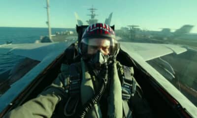 How did Top Gun shoot the movie in a US Navy fighter jet, and how much did it cost?