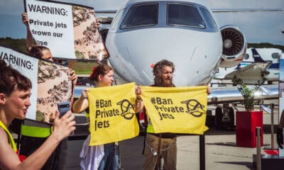 Protesters chained to private jets at EBACE force Geneva Airport to close
