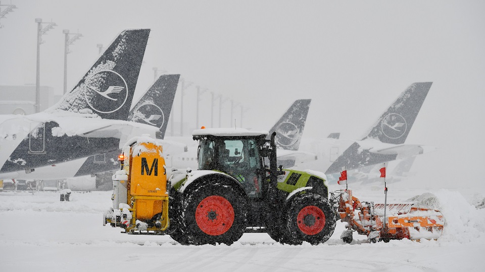 Frozen Wings: Munich Airport Paralyzed Amidst Snowstorm Chaos