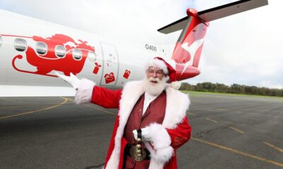 Qantas unveils special Christmas themed aircraft.