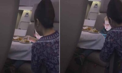 Singapore Airlines flight attendant spoon-feeding child on flight sparks debate