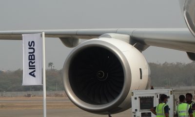 How does storing fuel in the wings help during long-haul flights?
